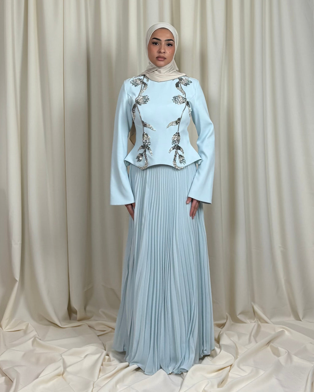 Sky blue pleated skirt and embroidered top set