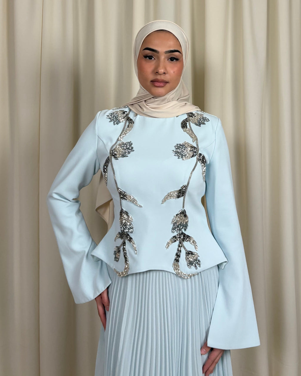 Sky blue pleated skirt and embroidered top set